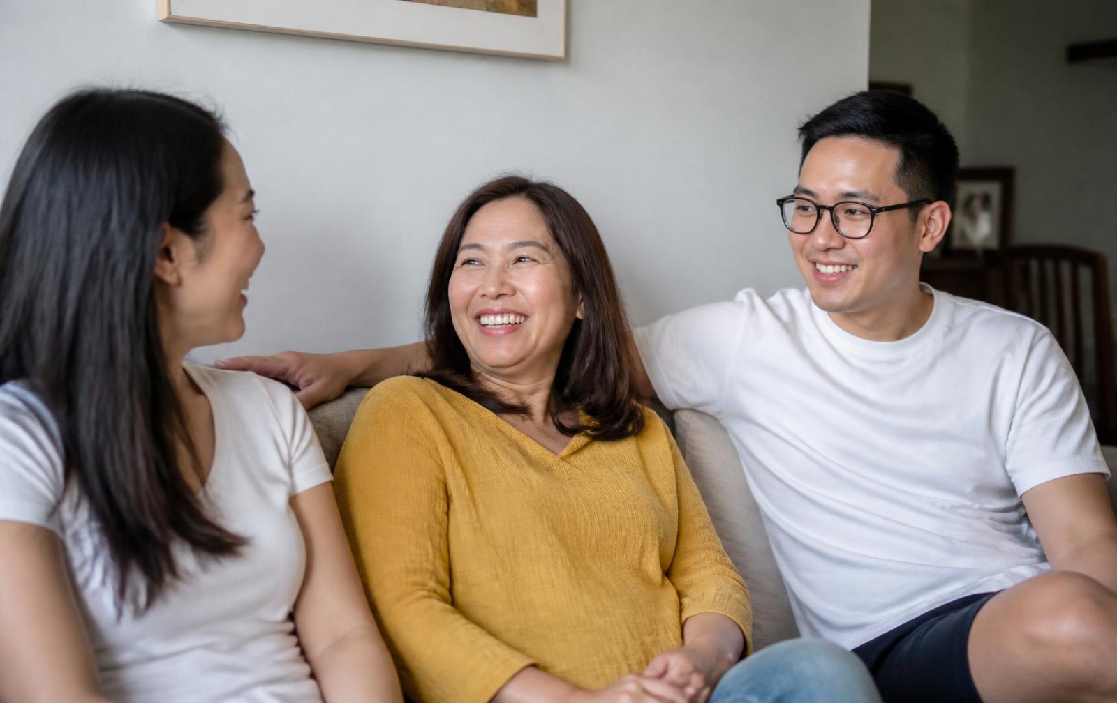 A Singaporean mother at home with her two grown children